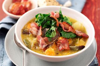 Winter vegetable soup with crispy bacon